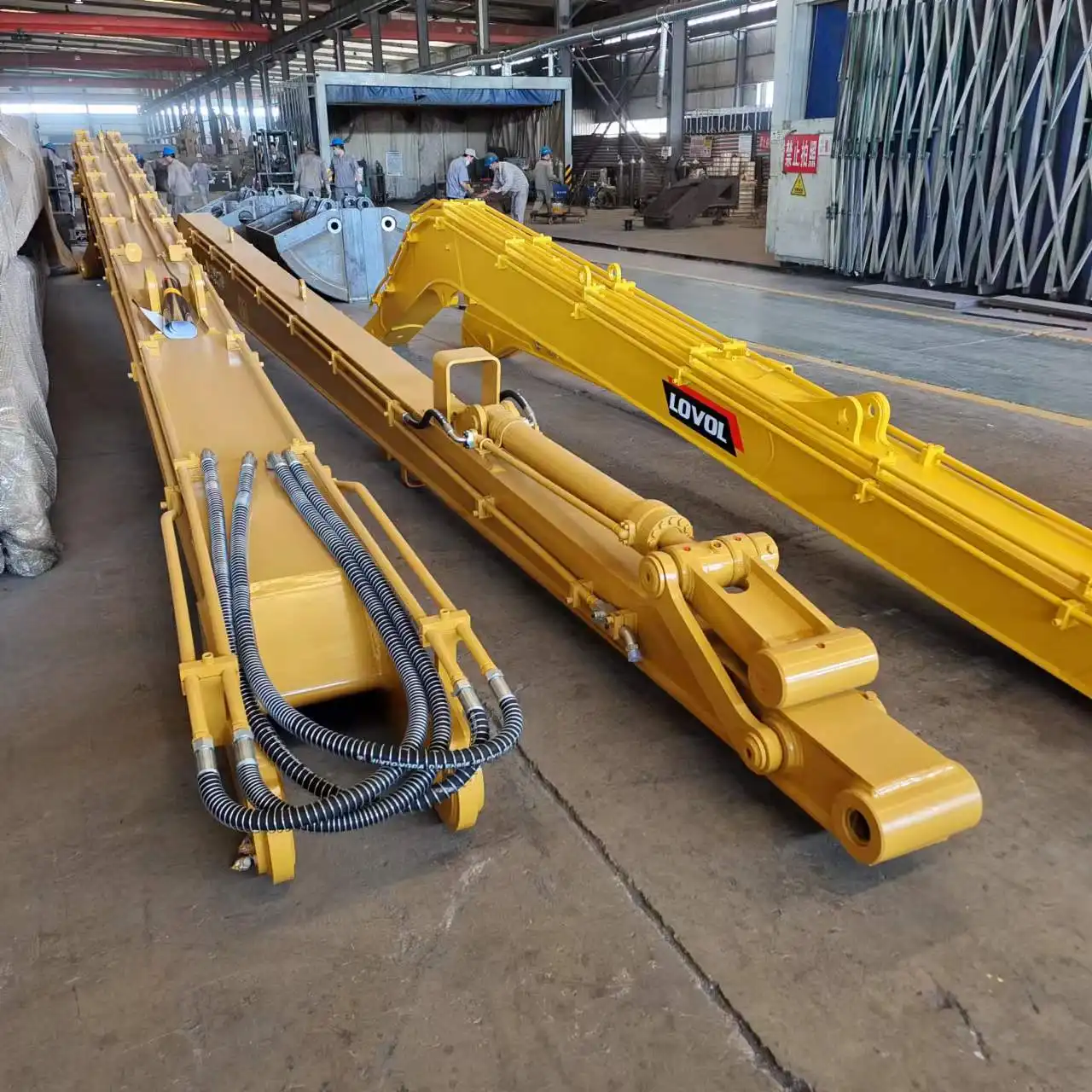 What are the key features of a heavy-duty excavator rock arm?